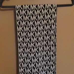 New with Tags Michael Kors Scarf. Black background with white MK logo